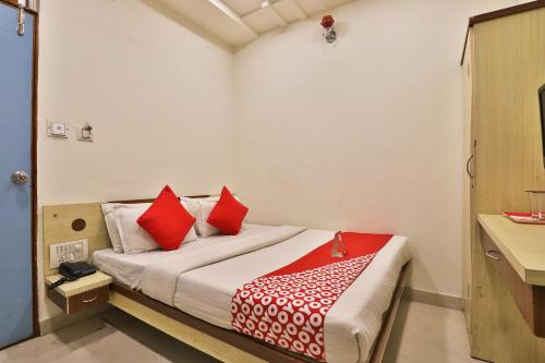 Ένα ή περισσότερα κρεβάτια σε δωμάτιο στο Hotel O Park Inn