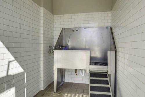 a small room with a sink in a bathroom at Landing Apartments Austin - Lockhart in Lockhart