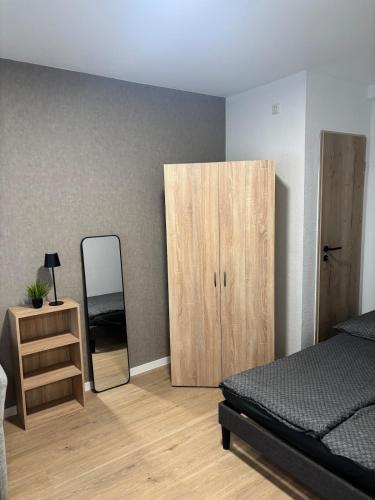 Un pat sau paturi într-o cameră la Apartment-Whiskey-Hundefreundlich