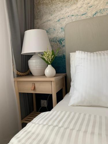 Katil atau katil-katil dalam bilik di Apartament w Centrum Słupska