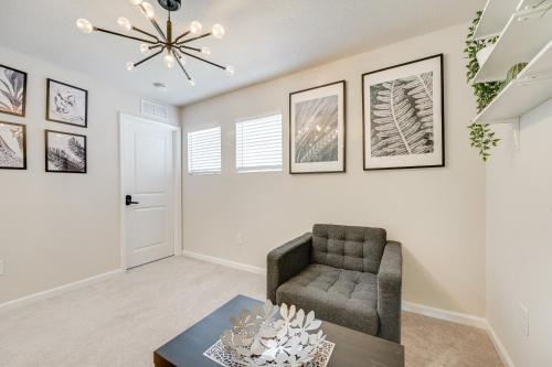 a living room with a chair and a table at Abi home in Brandon