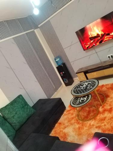 an overhead view of a living room with a fireplace at Serene homes eldoret in Eldoret
