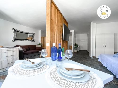 Una cama o camas en una habitación de Suite Amorosa by Babiniliving