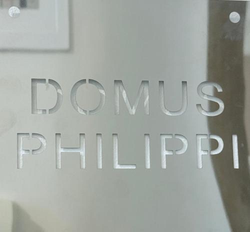 a sign for a drug store with the words drugs pinking at Domus Philippi in Larisa