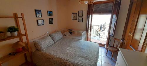 Postel nebo postele na pokoji v ubytování La casa del Mestre