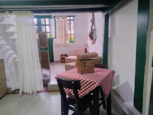 a box sitting on a table in a room at Hotel Veraneras del Quindío in Pueblo Tapao