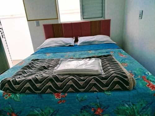 Postel nebo postele na pokoji v ubytování Pousada minha casa ouro verde