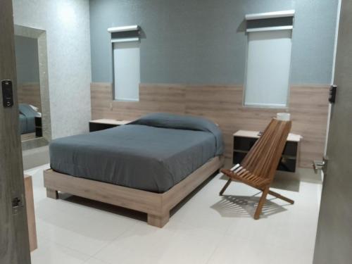 Ένα ή περισσότερα κρεβάτια σε δωμάτιο στο Lujosa Casa en Cumbres Elite