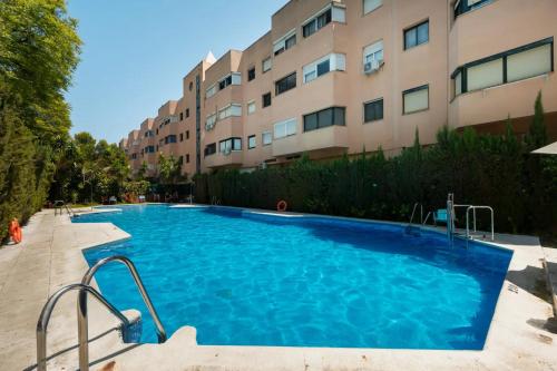 Palacio de Congresos piscina y parking