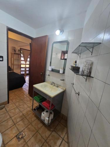 a bathroom with a sink and a mirror at Cerca de la plaza principal a estrenar in Formosa