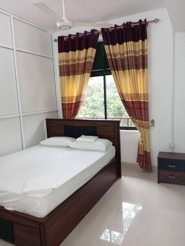 Postel nebo postele na pokoji v ubytování Huluganga Ella Resort - Geesh Residence