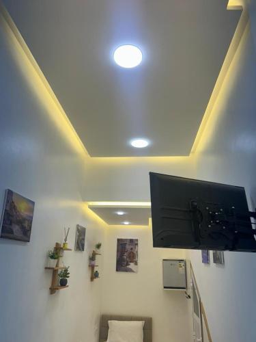 a room with a flat screen tv on a wall at Studio cozy 04 in Tangier