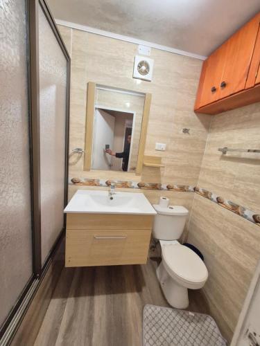 Ванная комната в Departamento frente al mar