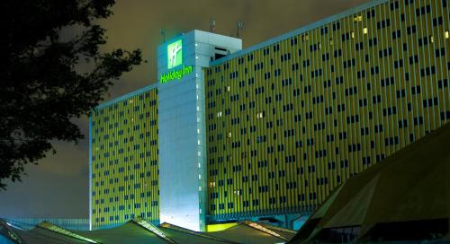 a large building with a sign on top of it at Holiday Inn Sao Paulo Parque Anhembi by IHG in Sao Paulo