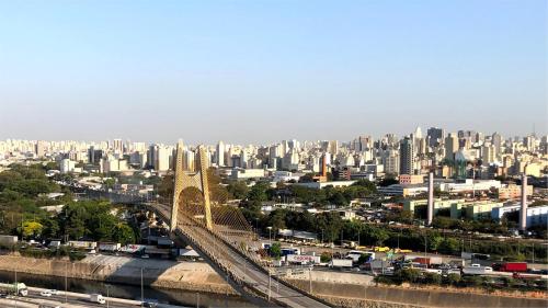 a view of a bridge in a city with buildings at Holiday Inn Sao Paulo Parque Anhembi by IHG in Sao Paulo