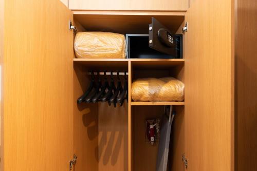 a cupboard with a bunch of knives in it at Holiday Inn Sao Paulo Parque Anhembi by IHG in Sao Paulo