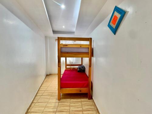 Hostal Amate Taxcoにあるベッド
