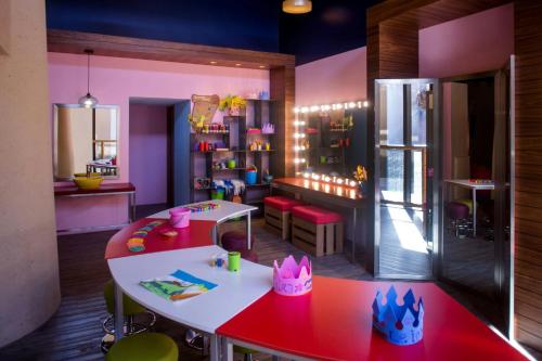 a childs room with a table and a toy store at JW Marriott Los Cabos Beach Resort & Spa in San José del Cabo