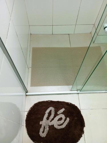 a brown rug on the floor in a glass ceiling at Seu Belém - Sua Estadia Paraense in Belém