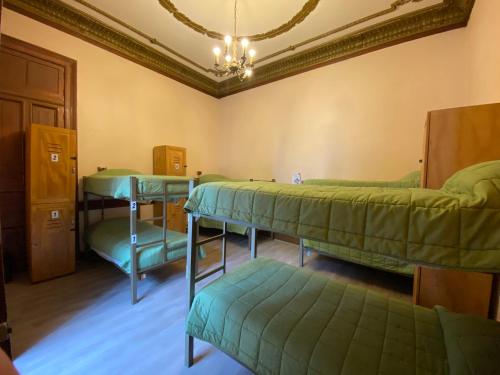 Katil atau katil-katil dalam bilik di La Casa Roja Hostel