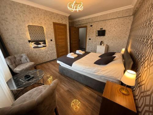 Katil atau katil-katil dalam bilik di Kütahya Şehir Otel