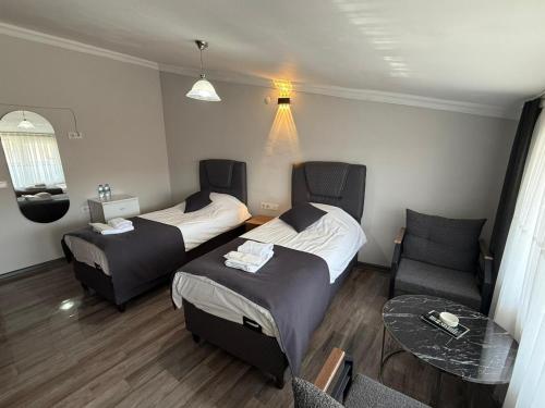 Katil atau katil-katil dalam bilik di Kütahya Şehir Otel