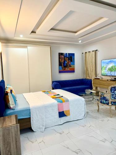 Ένα ή περισσότερα κρεβάτια σε δωμάτιο στο APPARTEMENT MODERNE AVEC PISCINE-ASCENSEUR DEUX PLATEAU,abidjan