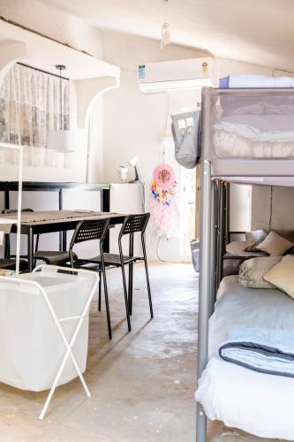 Postel nebo postele na pokoji v ubytování Tahom villas - Goa
