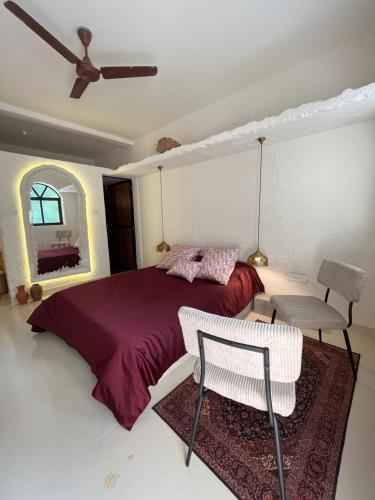 Postel nebo postele na pokoji v ubytování Tahom villas - Goa