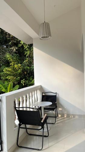 Posezení v ubytování Tahom villas - Goa