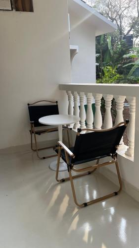Posezení v ubytování Tahom villas - Goa