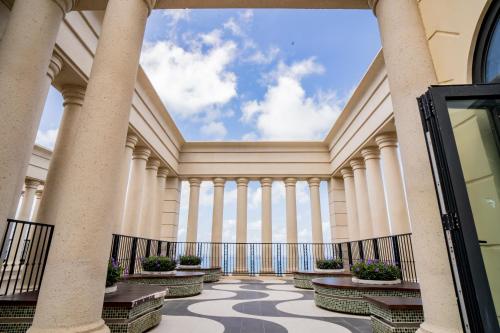 a view of a building with columns at Hayha Apartment by Haus Hospitality in Phu Quoc