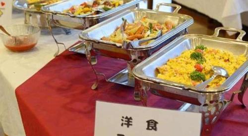 two trays of food sitting on a table at Hotel SP Haruno in Kochi