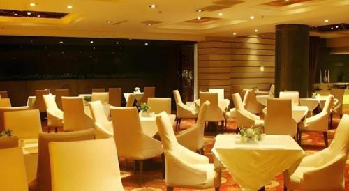 Χώρος καθιστικού στο Metropark Hotel