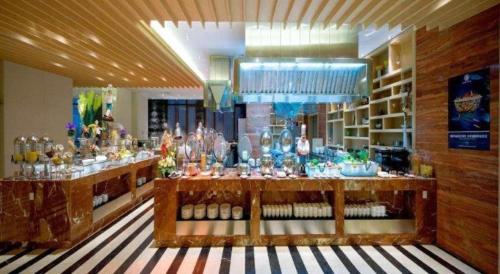 a store filled with lots of glass bottles on display at Xian Elegant Oriental Hotel in Xi'an