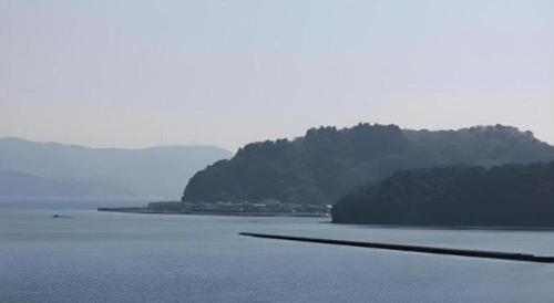 an island in the middle of a body of water at Hotel Matsuya in Shimanto