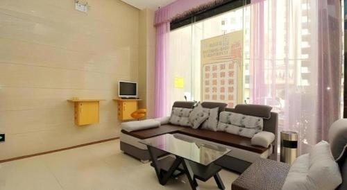 TV a/nebo společenská místnost v ubytování 7 Days Inn Fucheng Wu Gongci Gaodeng East Street Binjiang Road