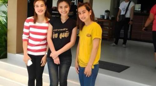 a group of three girls standing next to each other at Baan Ing Daan in Amnat Charoen
