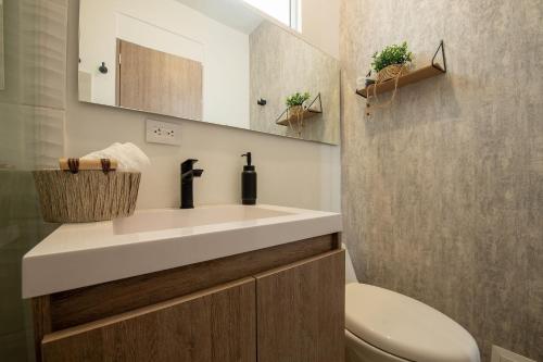Ένα μπάνιο στο Condominio Moderno nuevo Trevi