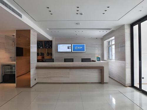 TV o dispositivi per l'intrattenimento presso City Comfort Inn Jinan West Station Shandong International Convention and Exhibition