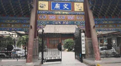 an entrance to a building with an iron gate at James Joyce Coffetel· Xianyang Renmin Road Central Square Store in Xianyang