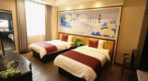 Postel nebo postele na pokoji v ubytování PAI Hotels Shijiazhuang Zhengding Gucheng