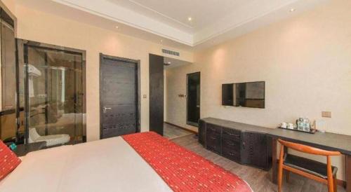 Postel nebo postele na pokoji v ubytování PAI Hotels Shijiazhuang Zhengding Gucheng