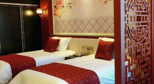 Postel nebo postele na pokoji v ubytování PAI Hotels Shijiazhuang Zhengding Gucheng