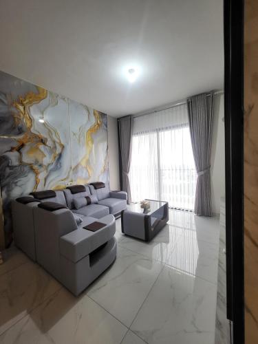 Coin salon dans l'établissement Luxury and Comfortable Residence