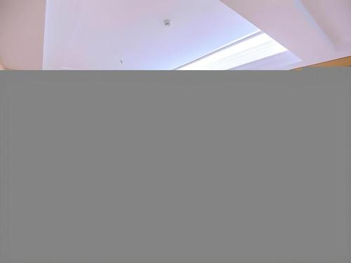 a view of the ceiling of a building at Vienna Hotel Hubei Xiangyang Tang City Gulou in Xiangyang