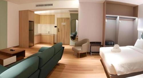 Кровать или кровати в номере J HOTEL