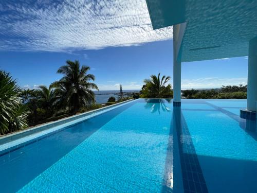 Bazén v ubytování Appartement Papeete-Airport, Parking, wifi,AC,Pool nebo v jeho okolí