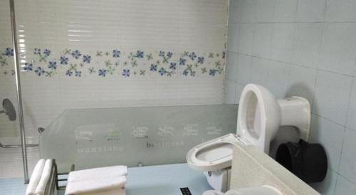 Koupelna v ubytování Wanxiang Hotel