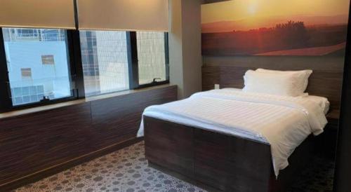 J Link Hotelにあるベッド